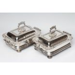 A PAIR OF OLD SHEFFIELD PLATE LARGE ENTREE DISHES, COVERS AND LINERS of rounded oblong form, the