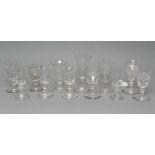 A COLLECTION OF SEVEN SMALL WINE GLASSES, early 19th century, each with a folded foot, tallest 4 1/