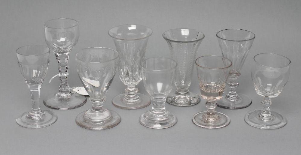 A COLLECTION OF NINE GEORGIAN AND LATER GLASSES including a cordial glass with facet cut stem, 5"