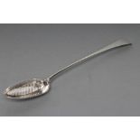 A GEORGE III SILVER STRAINER SPOON, maker's mark HS, London 1794, in Old English pattern engraved