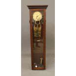 A MAHOGANY CASED ELECTRIC REGULATOR signed H.W. Mallett 1929, the 7" brass dial with Arabic