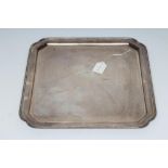 A SILVER SALVER, maker's mark G. Ltd., Sheffield 1938, of square form with re-entrant corners and