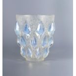 A LALIQUE GLASS RAMPILLON VASE, moulded with lozenge bosses on a blue stained flowerhead ground,