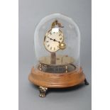 A BRIGGS TORSION ROTARY BALL PENDULUM CLOCK, the 2 1/4" enamel dial with Roman numerals, raised on