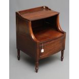 A REGENCY MAHOGANY "LANCASHIRE" COMMODE of bowed form with hinged galleried top on shaped