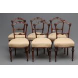 A SET OF SIX VICTORIAN WALNUT DINING CHAIRS upholstered in a cream and rust weave, the tapering open