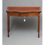 A GEORGIAN MAHOGANY SERPENTINE FOLDING CARD TABLE, late 18th century, the banded top with chequer