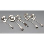 A PAIR OF EDWARDIAN SILVER CREAM LADLES, maker T.W. Dobson, London 1902, in Old English pattern,