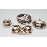 A SET OF FIVE BLOOR DERBY PORCELAIN DESSERT PLATES, c.1830, of shaped circular form with gadroon