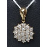 A DIAMOND CLUSTER PENDANT, the nineteen round brilliants collet set in milled white metal to a