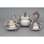 A SILVER THREE PIECE TEA SERVICE, maker E.S.Barnsley, Birmingham 1914 (teapot) and 1915, of