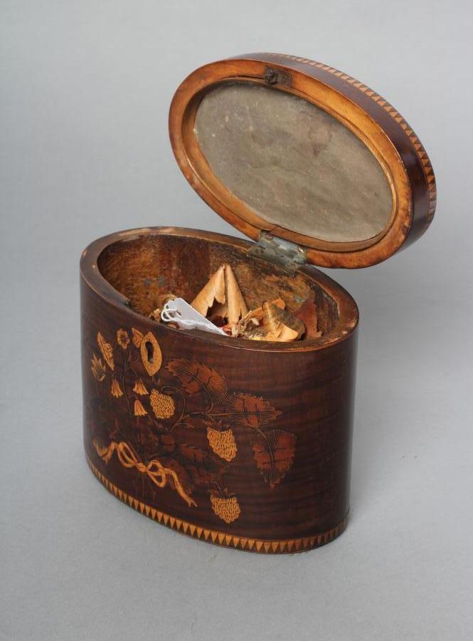 A REGENCY MAHOGANY TEA CADDY of oval form with ribbon tied marquetry flowers and berried branches, - Image 6 of 6