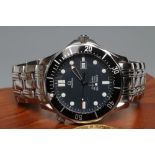 A GENTLEMAN'S OMEGA SEAMASTER PROFESSIONAL WRISTWATCH, the black waved dial with luminous dot and
