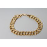 A CHAIN BRACELET, the double rope twist links to a lobster clasp stamped 18k (Est. plus 21%