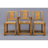 SID POLLARD OF THIRSK, a set of eight adzed oak dining chairs including two elbow chairs, the