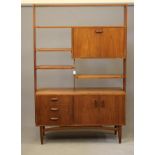 A G PLAN TEAK ROOM DIVIDER, 1960's, the open shelved upper section with cupboard with drop down door
