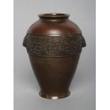 A CHINESE BRONZE VASE of ovoid form, the upper section cast with a band of stylised scroll panels