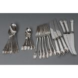 A SET OF SIX SILVER TABLE FORKS, dessert spoons and table knives, maker Cooper Bros. & Sons,