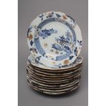 A SET OF TWELVE CHINESE EXPORT PORCELAIN SOUP PLATES of shaped circular form, painted in