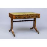 A REGENCY ROSEWOOD WRITING TABLE, the banded top inset with tooled leather, two frieze drawers