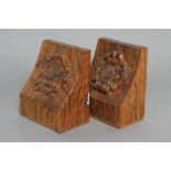 TOM WHITAKER OF LITTLEBECK, a pair of adzed oak bookends of dished oblong form carved with a