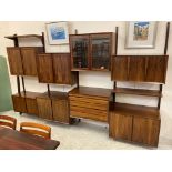 A ROSEWOOD MODULAR ROOM UNIT probably designed by Poul Cadovius, Royal System, comprising a pair
