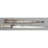 A CAUCASIAN DAGGER, the 12 5/8" dagger etched with Cossack and floral decoration, grip of typical