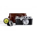 A REID & SIGRIST "REID" CAMERA, with Taylor-Hobson Anastigmat two inch f/2 lens No.328296, leather