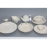 A COLLECTION OF STAFFORDSHIRE WHITE SALTGLAZE STONEWARE, 18th century, comprising an oval pecten