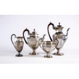 A LATE VICTORIAN SILVER FOUR PIECE TEA AND COFFEE SERVICE, maker Aldwinkle & Slater, London 1888, of