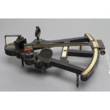 A HUGHES OF LONDON SEXTANT, of wooden construction, with brass fixings and inlaid with ivory for the