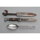 A HITLER YOUTH KNIFE, with 5" blade, third reich enamel lozenge to grip and metal sheath with