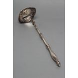 A GEORGE IV SCOTTISH SILVER PUNCH LADLE, maker's mark rubbed, Edinburgh 1825, the double lipped oval