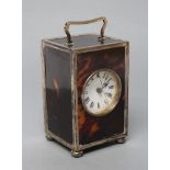 A SILVER MOUNTED TORTOISESHELL CARRIAGE CLOCK, maker's mark rubbed, London 1922, of plain oblong