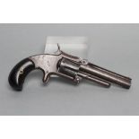 A SMITH & WESSON .32 RIMFIRE REVOLVER, the 3 1/2" barrel stamped with maker's name and address to