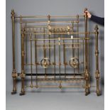 A VICTORIAN TURNED BRASS DOUBLE BEDSTEAD, the end posts with turned finials, the sectional foot
