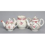 TWO LOWESTOFT PORCELAIN TEAPOTS AND COVERS, c.1780, each of globular form painted in Curtis style