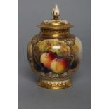 A ROYAL WORCESTER CHINA POT POURRI VASE AND COVER, 1925, of lobed cylindrical form, painted in
