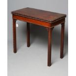A MAHOGANY FOLDING CARD TABLE of mid Georgian design, 19th century, the oblong swivel top with