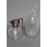 A BOHEMIAN GLASS CLARET JUG, late 19th, of slender ovoid form, cut and etched with a stag running in