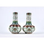A PAIR OF CHINESE PORCELAIN VASES of baluster form, the tall necks painted in famille verte