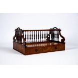 A REGENCY ROSEWOOD AND BURR WALNUT BOOK CARRIER in the manner of Gillow, c.1820, of oblong form with