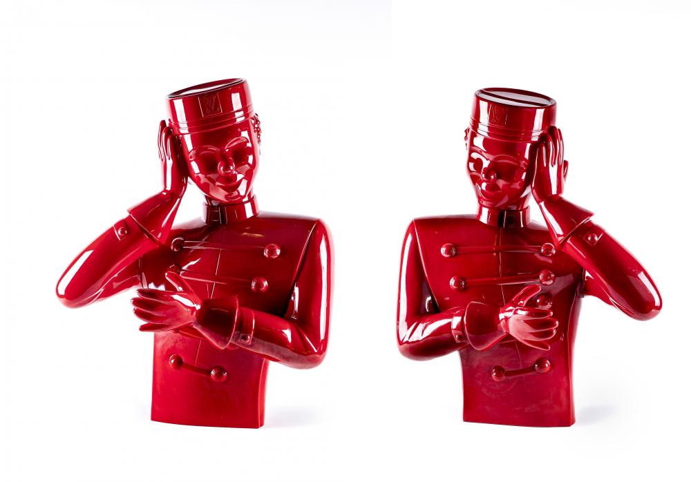 A PAIR OF LOUIS VUITTON BELL BOY ADVERTISING FIGURES in red plastic with foam centre, "Louis