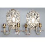 A PAIR OF SILVERED METAL TWIN BRANCH WALL SCONCES in the William & Mary style, early 20th century,
