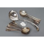 A SET OF TWELVE SILVER RAT-TAIL PATTERN SOUP SPOONS, maker Frank Cobb, Sheffield 1927, together with