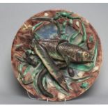 A PALISSY STYLE MAJOLICA PLAQUE, late 19th century, of circular form, moulded and applied in high