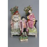 A PAIR OF OBADIAH SHERRATT TYPE PEARLWARE FIGURES, c.1810, modelled as "Elijah &" (sic) and "Widow",