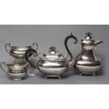 A SILVER TEAPOT AND COFFEE POT, maker CS & S, Sheffield 1924, of rounded oblong baluster form upon