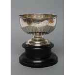 A LATE VICTORIAN SILVER SMALL ROSE BOWL, maker Walker & Hall, Sheffield 1893, of semi-fluted