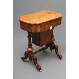 A VICTORIAN WALNUT AND MARQUETRY WORK TABLE of oblong form with rounded ends, the quarter veneered